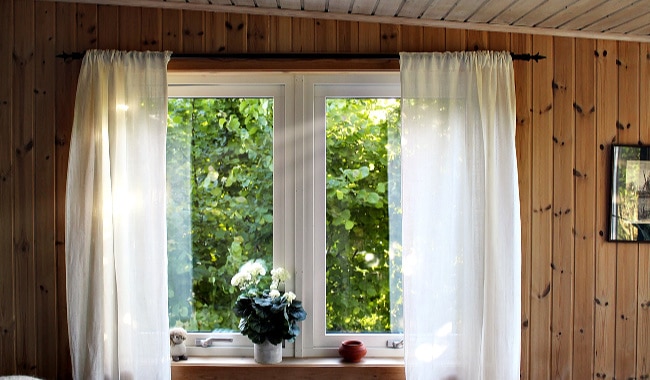 Hampton Bay Blinds & Curtains in a Sunny Room